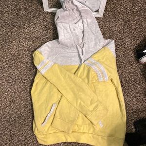 A yellow and gray hoodie